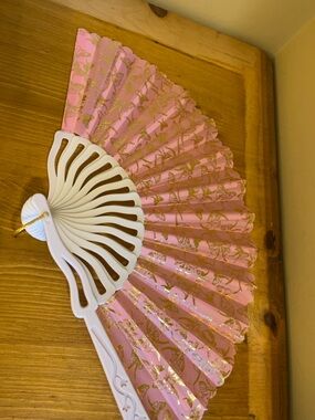 Pink background golden butterfly design Style Hand Fan w/ white accents 15 “